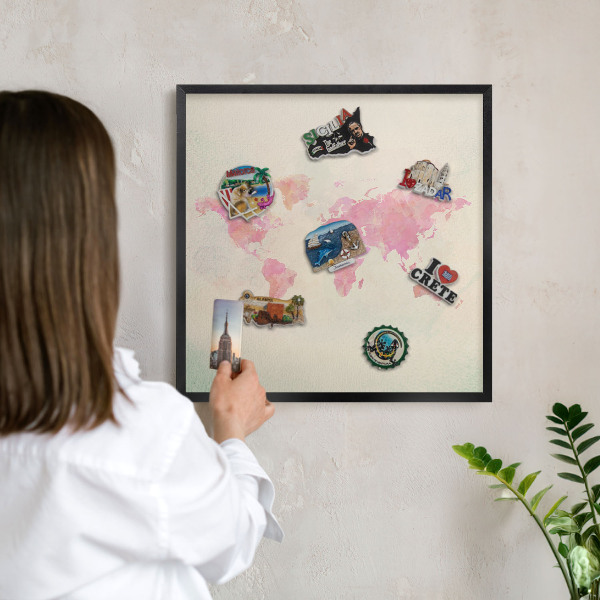 Metal wall board for magnets in a black frame World map