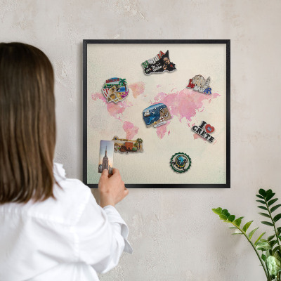 Metal wall board for magnets in a black frame World map