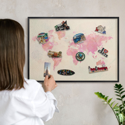 Metal wall board for magnets in a black frame World map