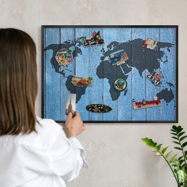 Metal wall board for magnets in a black frame World map