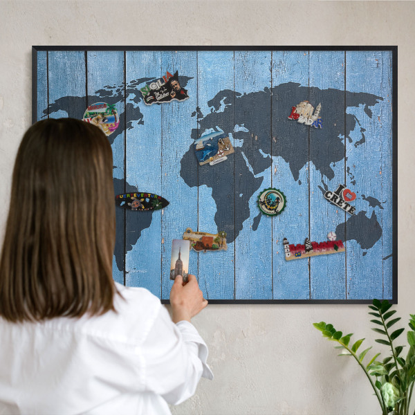 Metal wall board for magnets in a black frame World map