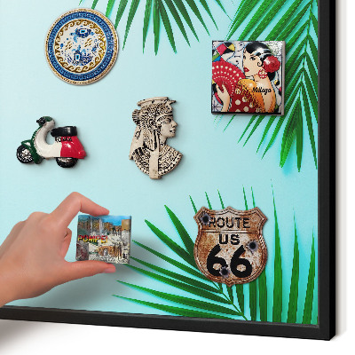 Vacation magnet board with a black frame Green leaves