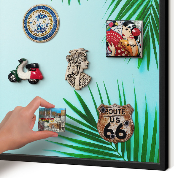 Vacation magnet board with a black frame Green leaves