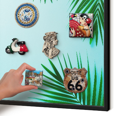 Vacation magnet board with a black frame Green leaves