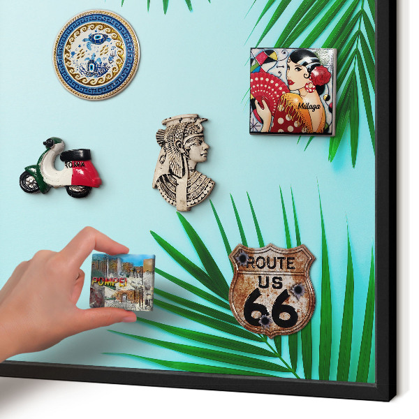 Vacation magnet board with a black frame Green leaves