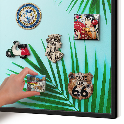 Vacation magnet board with a black frame Green leaves