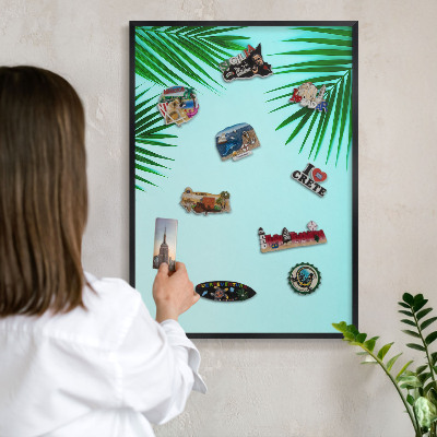 Vacation magnet board with a black frame Green leaves