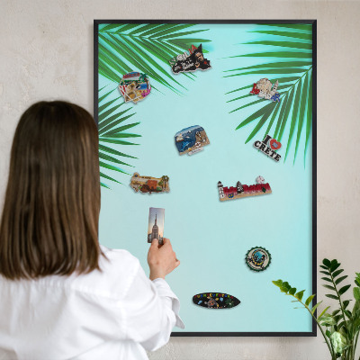 Vacation magnet board with a black frame Green leaves