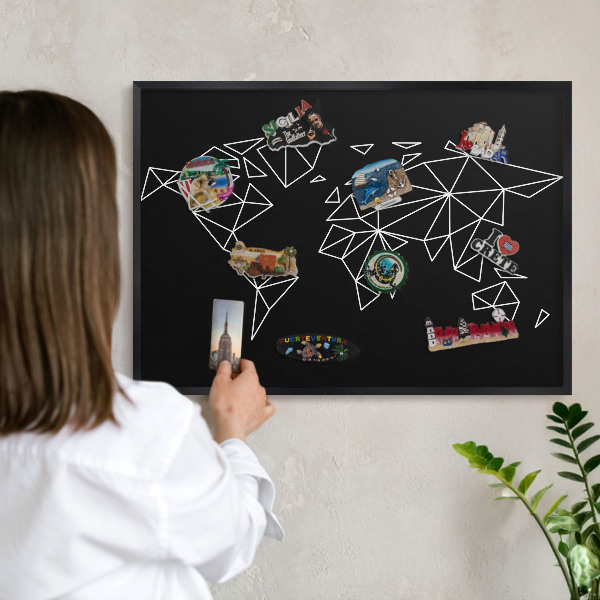 Metal wall board for magnets in a black frame World map