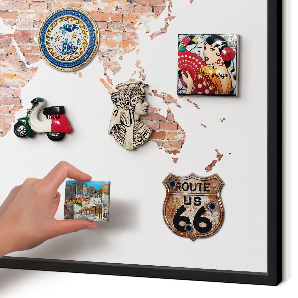 Vacation magnet board with a black frame Brick map