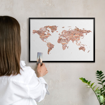 Vacation magnet board with a black frame Brick map
