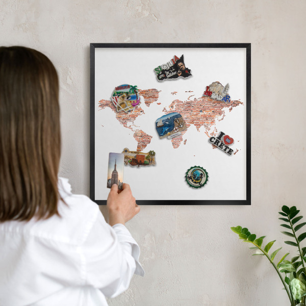 Vacation magnet board with a black frame Brick map