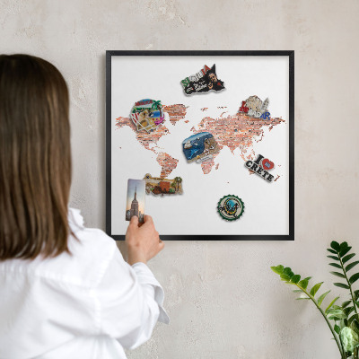 Vacation magnet board with a black frame Brick map