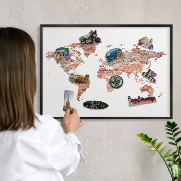 Vacation magnet board with a black frame Brick map