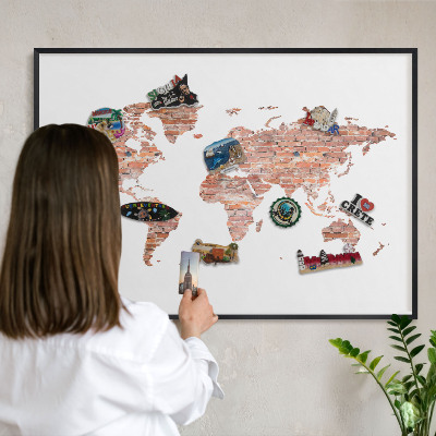Vacation magnet board with a black frame Brick map