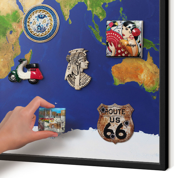 Vacation magnet board with a black frame Mapping the globe