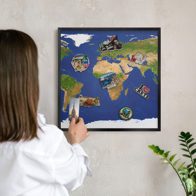 Vacation magnet board with a black frame Mapping the globe