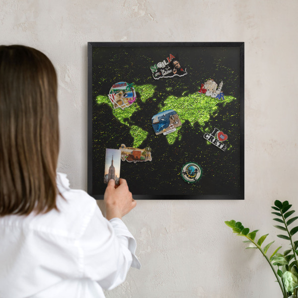 Metal wall board for magnets in a black frame Green map