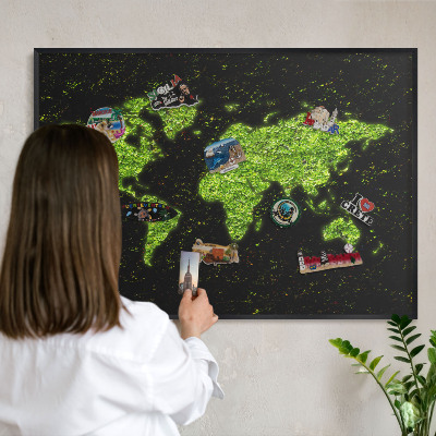 Metal wall board for magnets in a black frame Green map