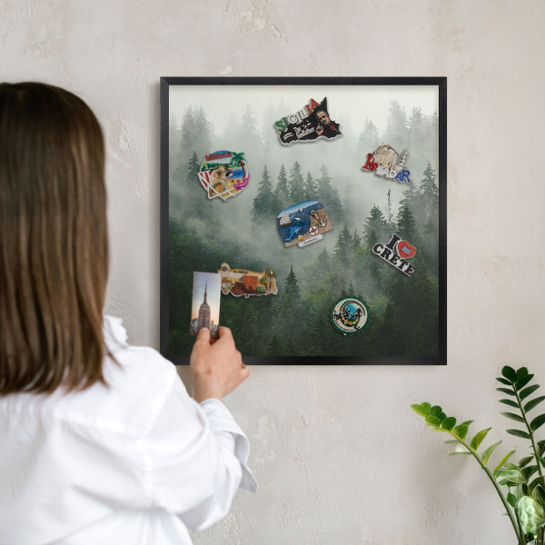 Metal wall board for magnets in a black frame Forest magic