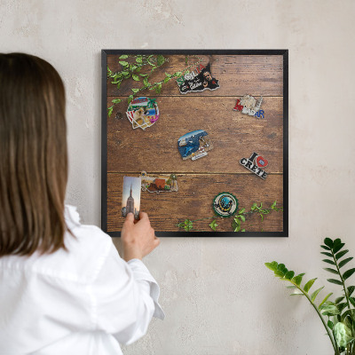 Vacation magnet board with a black frame Wood nature