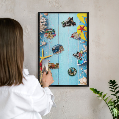 Vacation magnet board with a black frame Holiday beach
