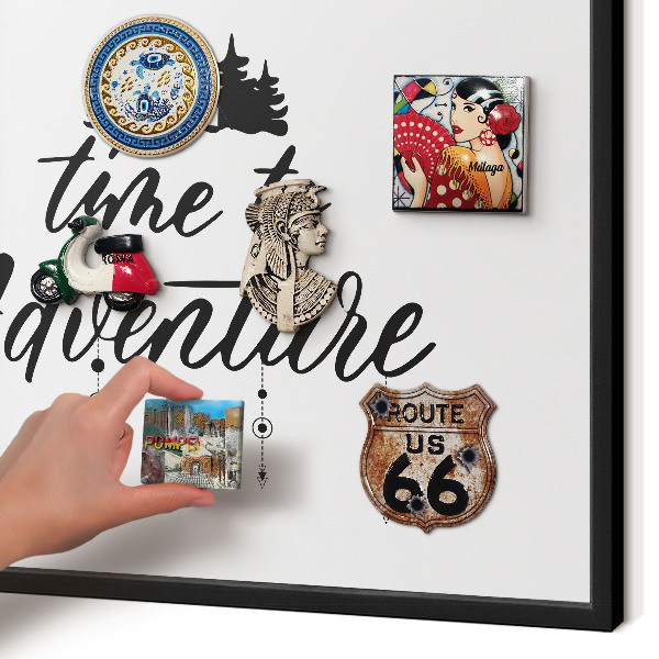 Metal wall board for magnets in a black frame Adventure awaits