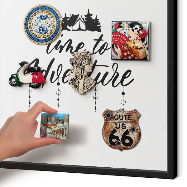 Metal wall board for magnets in a black frame Adventure awaits