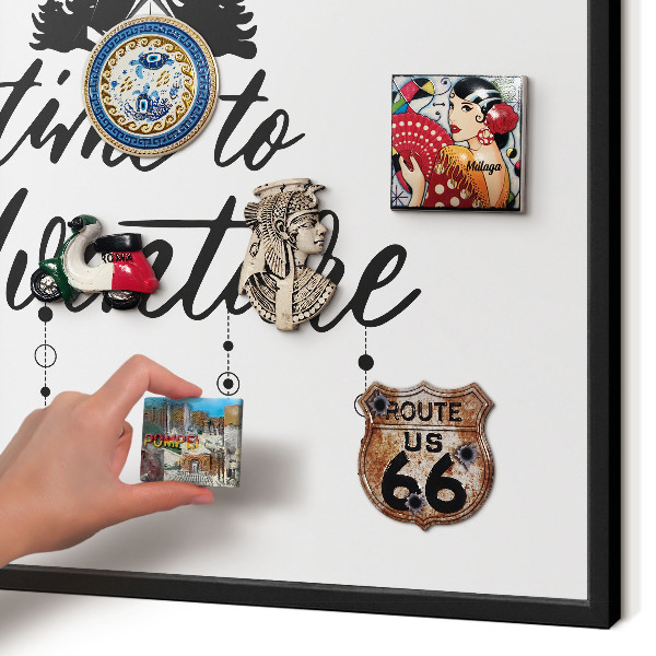 Metal wall board for magnets in a black frame Adventure awaits