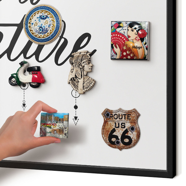Metal wall board for magnets in a black frame Adventure awaits