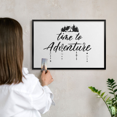 Metal wall board for magnets in a black frame Adventure awaits