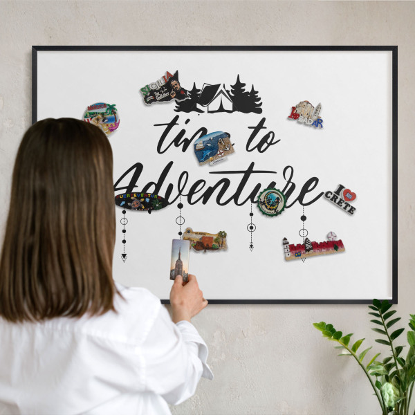 Metal wall board for magnets in a black frame Adventure awaits