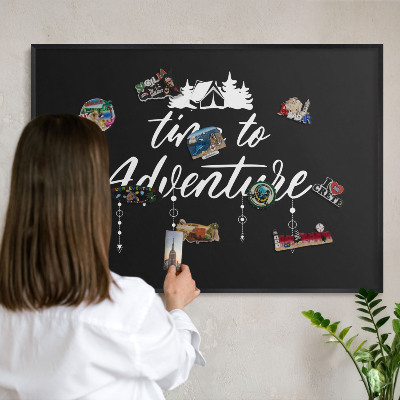 Vacation magnet board with a black frame Adventure awaits