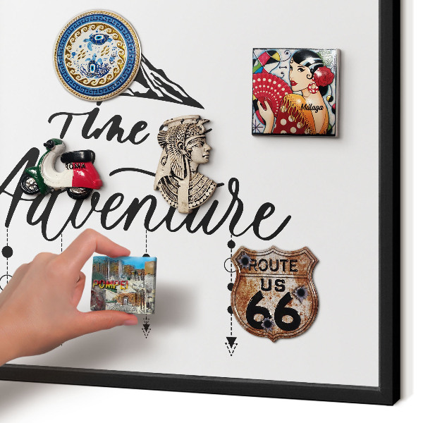 Metal wall board for magnets in a black frame Mountain adventure