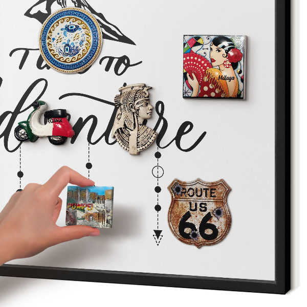 Metal wall board for magnets in a black frame Mountain adventure