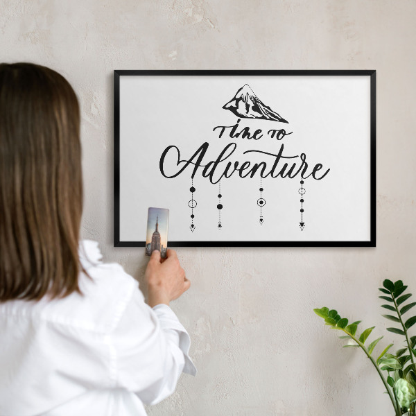 Metal wall board for magnets in a black frame Mountain adventure