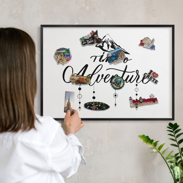 Metal wall board for magnets in a black frame Mountain adventure