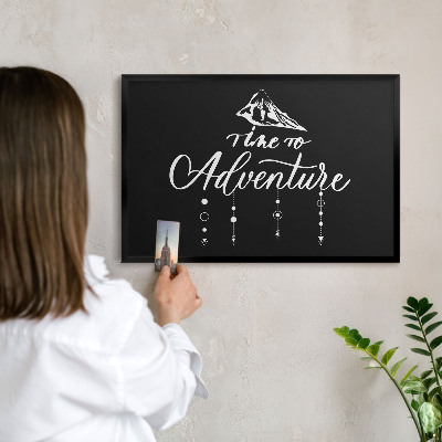 Vacation magnet board with a black frame Adventure awaits