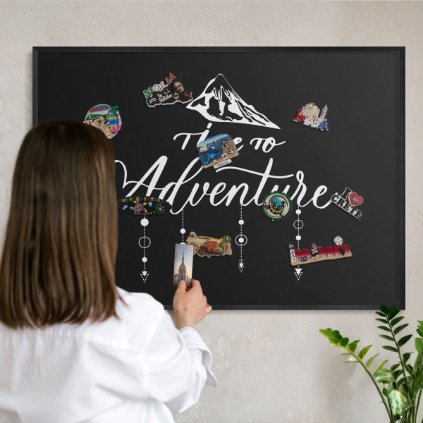 Vacation magnet board with a black frame Adventure awaits