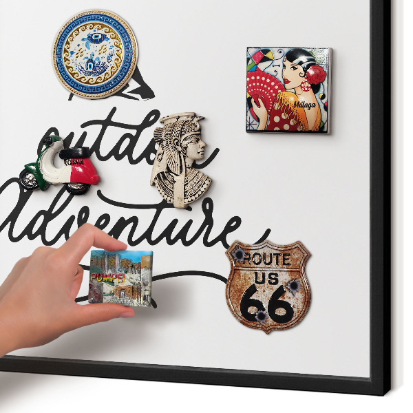 Metal wall board for magnets in a black frame Mountain adventure