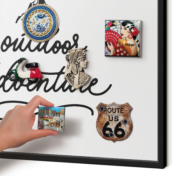 Metal wall board for magnets in a black frame Mountain adventure