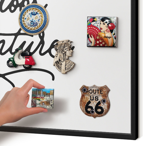 Metal wall board for magnets in a black frame Mountain adventure