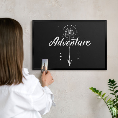 Vacation magnet board with a black frame Adventure awaits