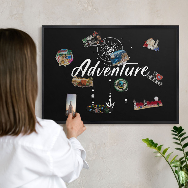 Vacation magnet board with a black frame Adventure awaits