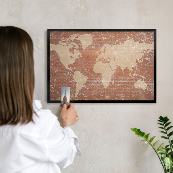 Vacation magnet board with a black frame Brick map