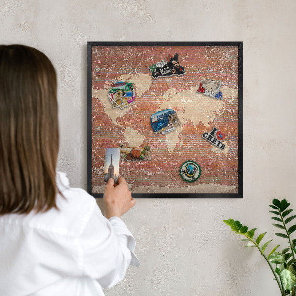 Vacation magnet board with a black frame Brick map