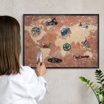 Vacation magnet board with a black frame Brick map