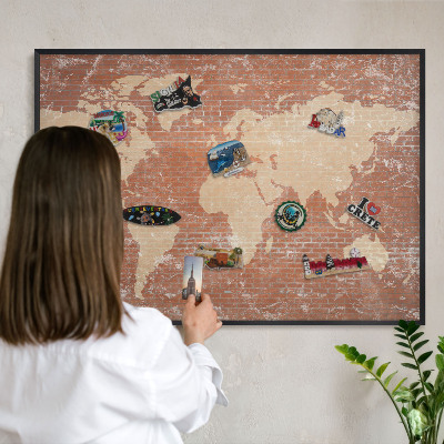 Vacation magnet board with a black frame Brick map