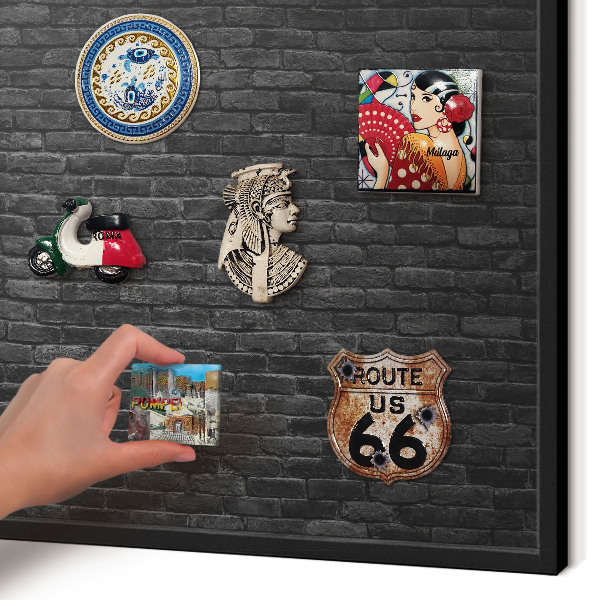 Metal wall board for magnets in a black frame Brick wall