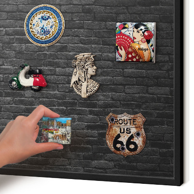 Metal wall board for magnets in a black frame Brick wall